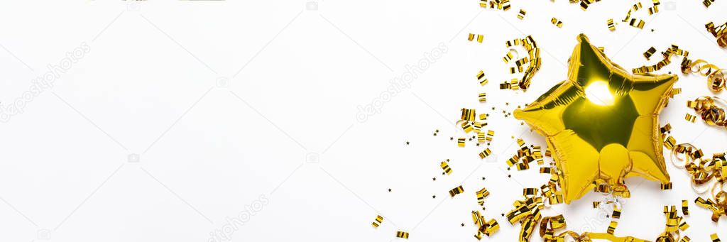 Air golden balloons star and confetti shape on a white background. Concept of a holiday, party, birthday, decoration. Banner Flat lay, top view