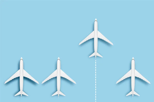 One airplane is faster than several others on a blue background. Concept travel, airline tickets, flight, route pallet, transfer, leader, boss, creative. Banner. Flat lay, top view.