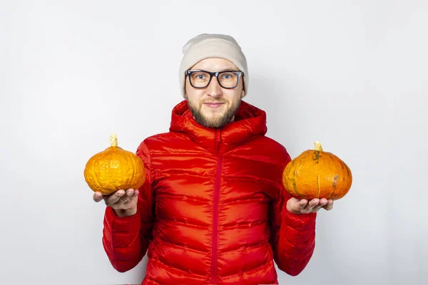 Happy Young Man Red Jacket Hat Holds Two Pumpkins Light — Stock Photo, Image