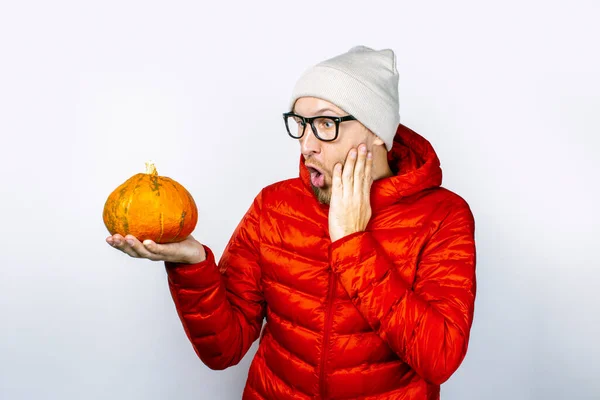 Young Man Red Jacket Hat Holds Pumpkin Looks Her Scared — Stock Photo, Image