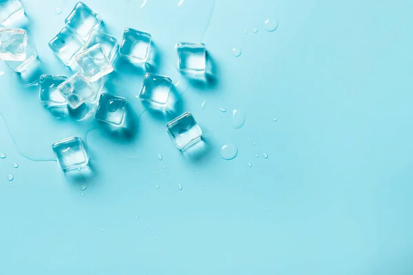 Cubos Hielo Con Agua Sobre Fondo Azul Concepto Hielo Para —  Fotos de Stock