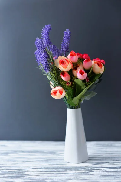 vase with flowers purple lilac lavender  on the window