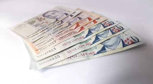Singaporese Dollar op witte achtergrond — Stockfoto