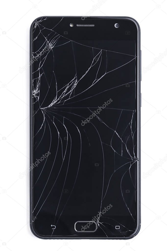 Top view on broken damaged cracked glass of black smartphone isolated on a white background. White cracks on the black screen. The concept of stress, nervousness, carelessness, repair of gadgets.