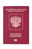 Na bílém pozadí ležel rudý mezinárodní pas občana Ruské federace. Prvek návrhu, cesta k oříznutí.