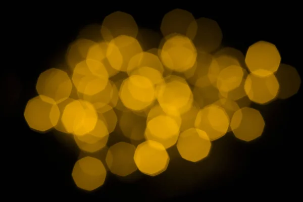 Resumen, festivo, navidad, fondo de año nuevo de luces borrosas doradas. El concepto de unas vacaciones, fiesta. Fondo perfecto para tarjetas de felicitación, banner, objetos de lujo . —  Fotos de Stock