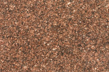 Üst manzara, küçük çakıl ve kum tanelerinden yapılmış sokak fayanslarının yüzeyine yakın. Soyut moda modern doku arkaplanı