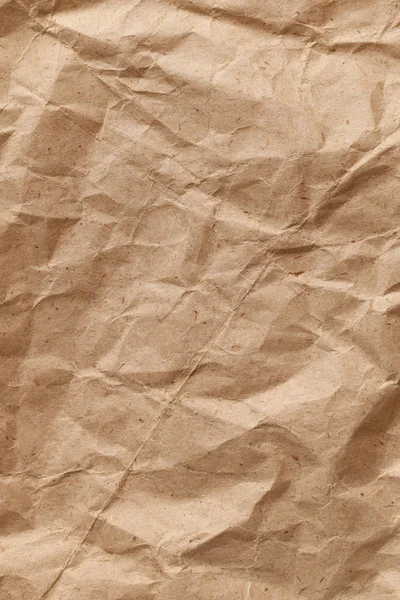 Een Verticaal Georiënteerd Stuk Verfrommeld Gebruikt Wikkelpapier Met Ruwe Plooien — Stockfoto