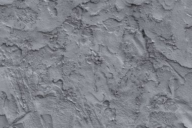 Eşit olmayan bir şekilde yerleştirilmiş gri çimento alçı. Soyut modern trend beton doku arkaplanı