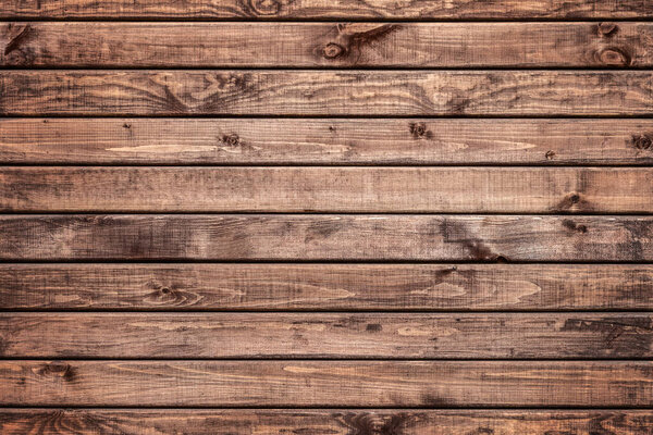 Горизонтальные доски из коричневого дерева. Деревянный забор или стена. Абстрактный модный фон современной текстуры дерева
