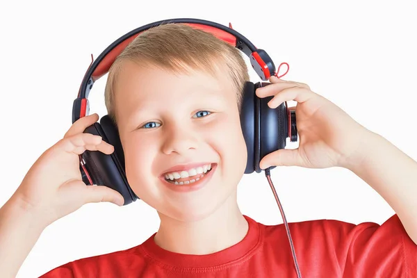 Attractive Cute Laughing Happy Boy Listening Music Holding Hands Headphones Royalty Free Stock Photos