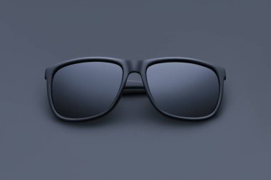 Siyah arka planda modern katlanmış güneş gözlüklerinin ön görünümü