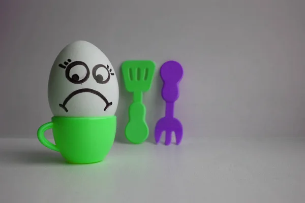 Eggs with face. Concept of diet — Stock Photo, Image