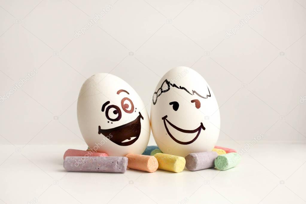 Eggs with painted faces. Photo for your design