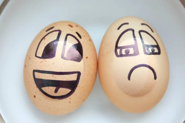 Egg with a cheerful painted face. Photo — Stock Photo, Image