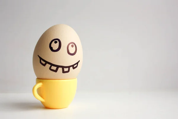 Eggs with painted face. Concept — Stock Photo, Image