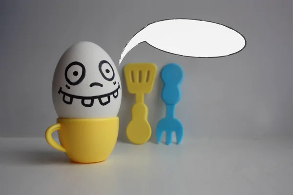 Eggs with face. Concept of a freak — Stock Photo, Image