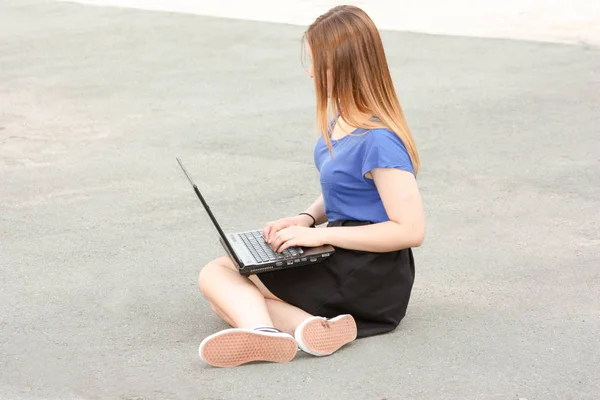 Office personal online concept. Girl with laptop