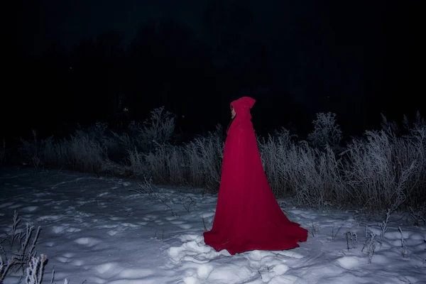 Halloween concept. Witch in red against