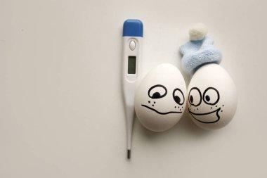 hastalık sıcaklık kavramı. komik yumurta