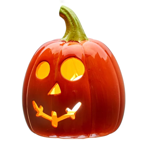 pumpkin for Halloween shining eyes nose and mouth isolated on white background