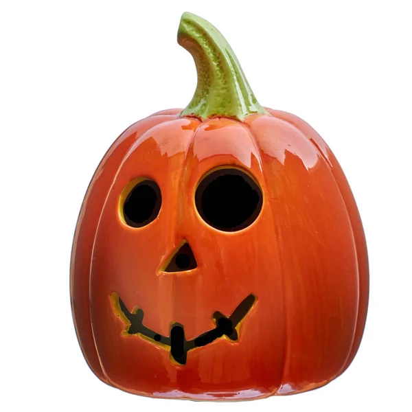 Calabaza de cerámica para Halloween con ojos negros mirando a la derecha aislado sobre fondo blanco —  Fotos de Stock