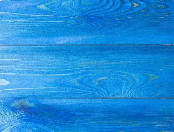 Tablero de madera pintado con pintura azul. La textura de la madera, donde desea copiar . — Foto de Stock