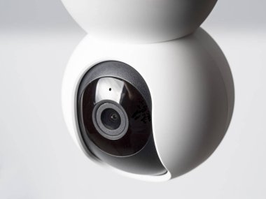 Close-up Wireless surveillance camera isolated on white background, a Concept of a home surveillance and intrusion protection system
