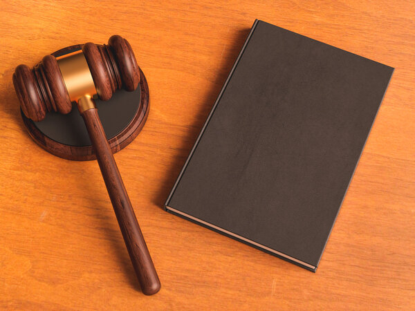 Judge's gavel on wooden table. 3D illustration