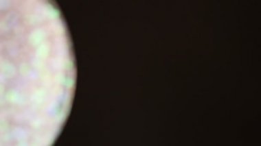 Bokeh arka plan parlayan bulanık parçacık hareket