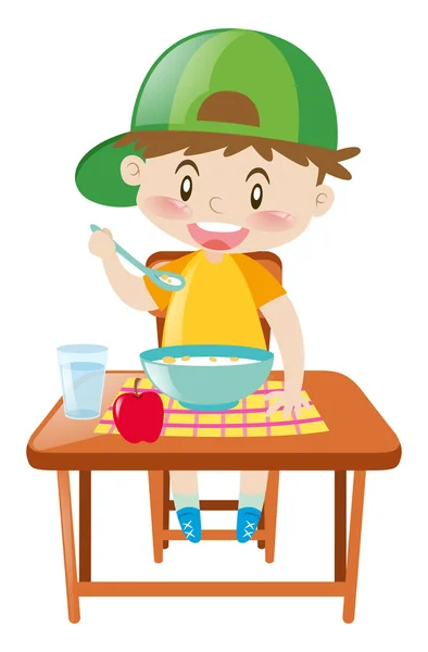Mały chłopiec o stół jedzenie śniadanie — Wektor stockowy