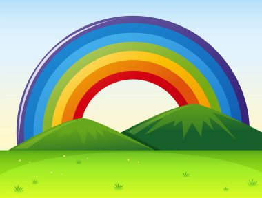 Tepelerin üstünde gökkuşağı ile doğa manzara