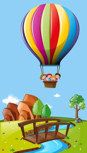Niños montando globos sobre el campo — Vector de stock