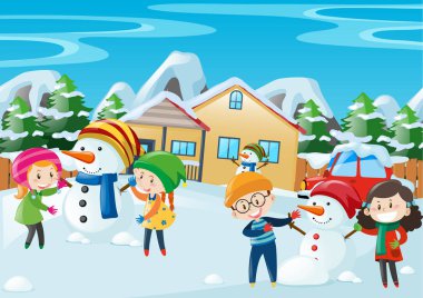 Kışın oynayan mutlu çocuklar