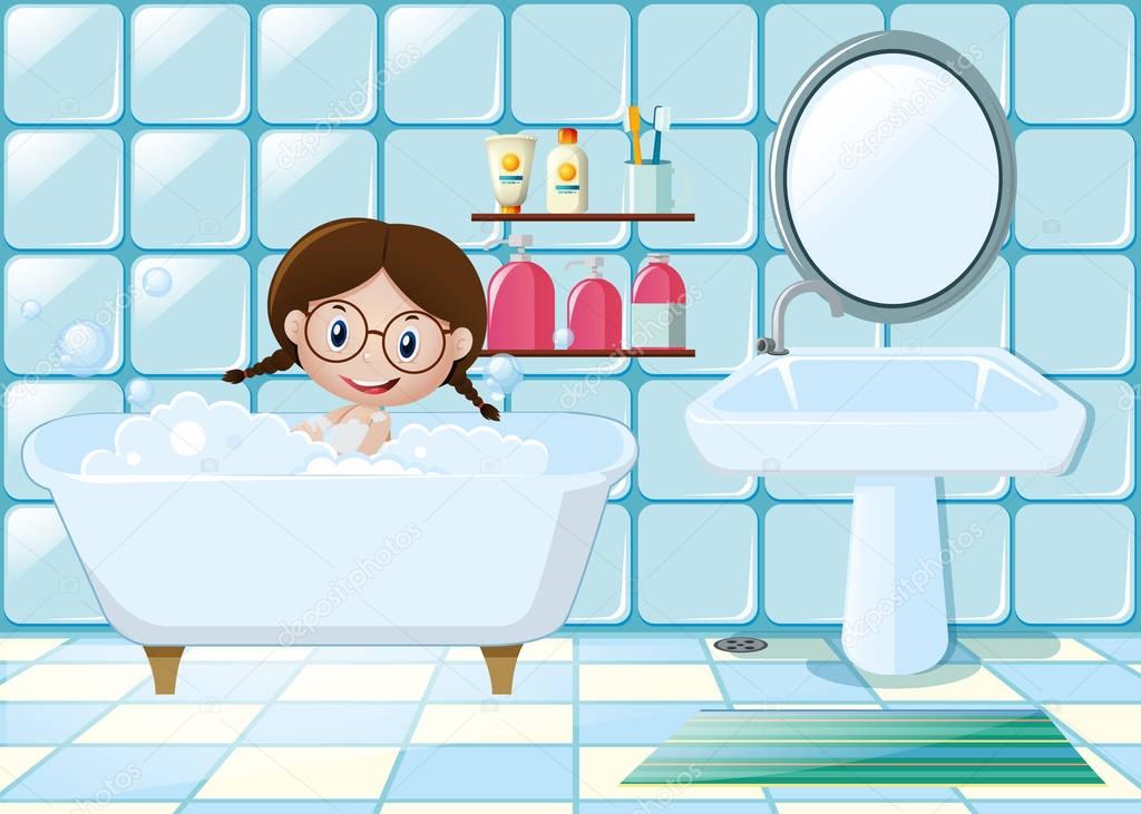 Little girl taking bath in bathroom