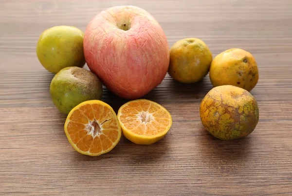 Slices of fresh Navel orange fruit on wooden background,healthy food