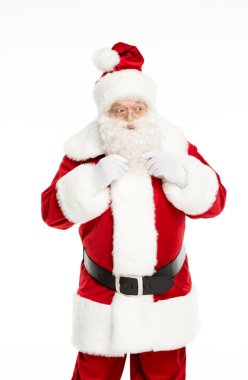 Noel Baba kılığında ve el hareketi