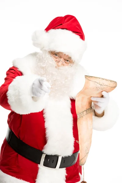 Santa Claus reading wishlist — Stock Photo, Image