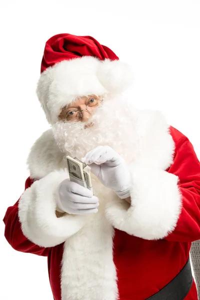 Santa Claus counting dollar banknotes