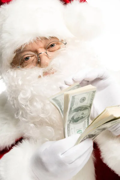 Santa Claus počítání dolarů — Stock fotografie