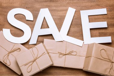 Sale sign with gift boxes  clipart