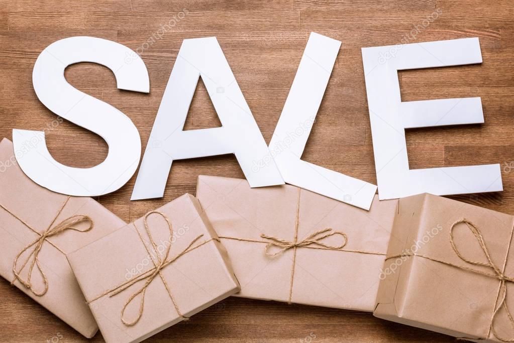 Sale sign with gift boxes 
