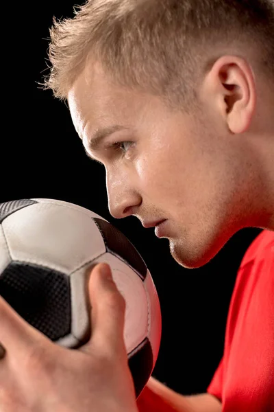 Soccer player holding ball — Stock Photo, Image