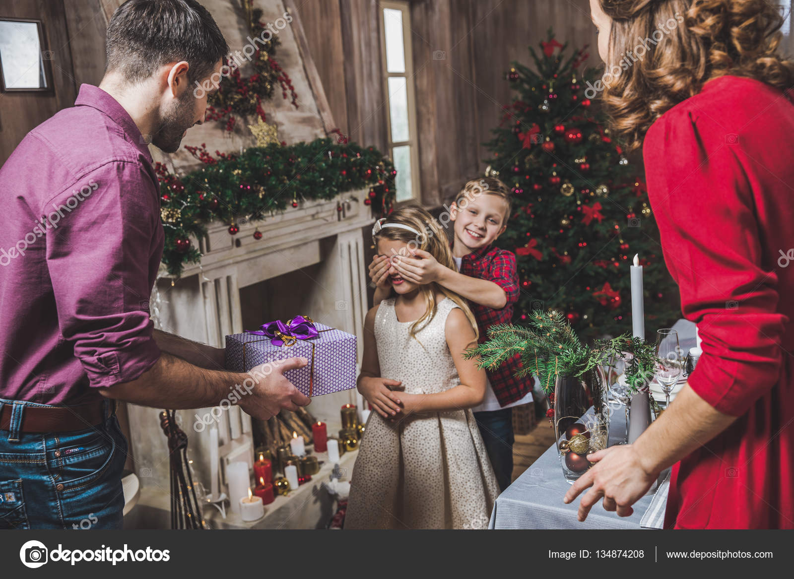 Girl receiving present Stock Photo by ©ArturVerkhovetskiy 134874208