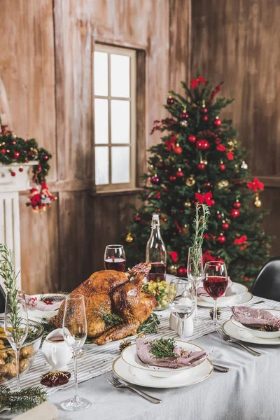 Roasted turkey on holiday table — Stock Photo, Image