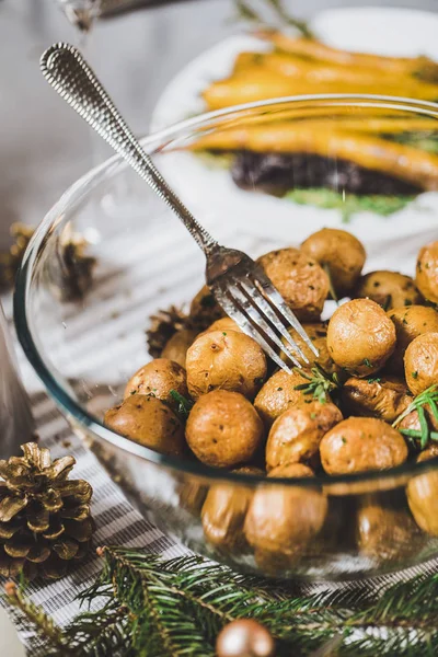Roasted potatoes in bowl — Stock Photo, Image