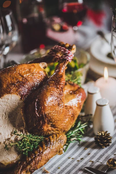 Roasted turkey on holiday table — Stock Photo, Image