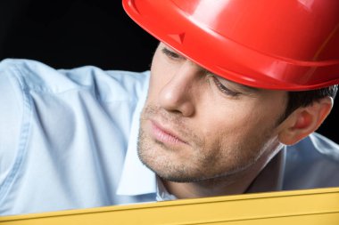 Male engineer in hard hat clipart