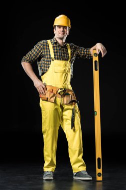 Construction worker with level tool clipart