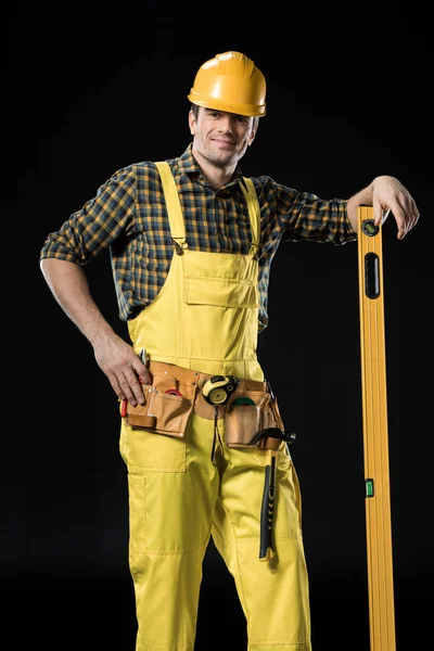 Construction worker with level tool — Stock Photo, Image